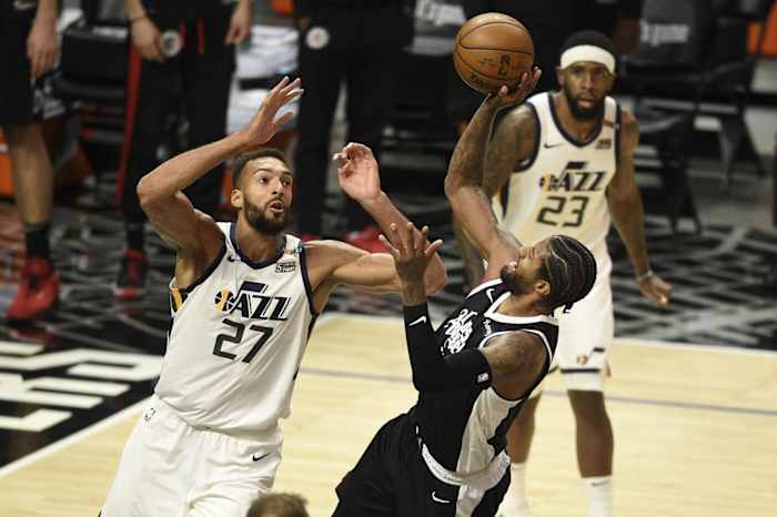 Rudy Gobert (27) guards Paul George (13)